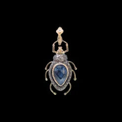 BEETLE ENHANCER WITH WHITE QUARTZ AND BLUE PIETERSITE