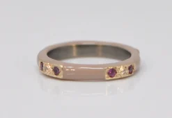 LIGHT NUDE ENAMEL STACK BAND WITH CHAMPAGNE DIAMONDS AND PURPLE GARNETS