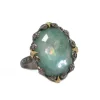 OVAL EMERALD AND CRIVELLI STATEMENT RING
