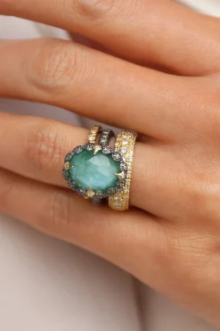 OVAL EMERALD AND CRIVELLI STATEMENT RING